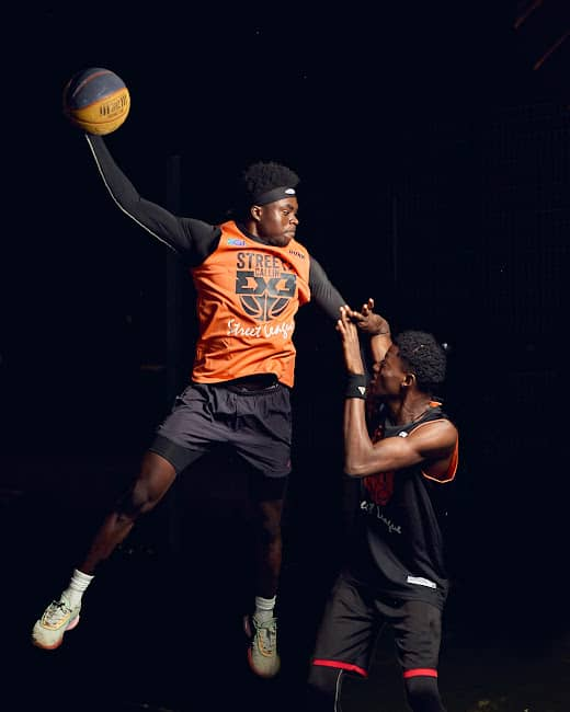 Basketball players in action during a game.