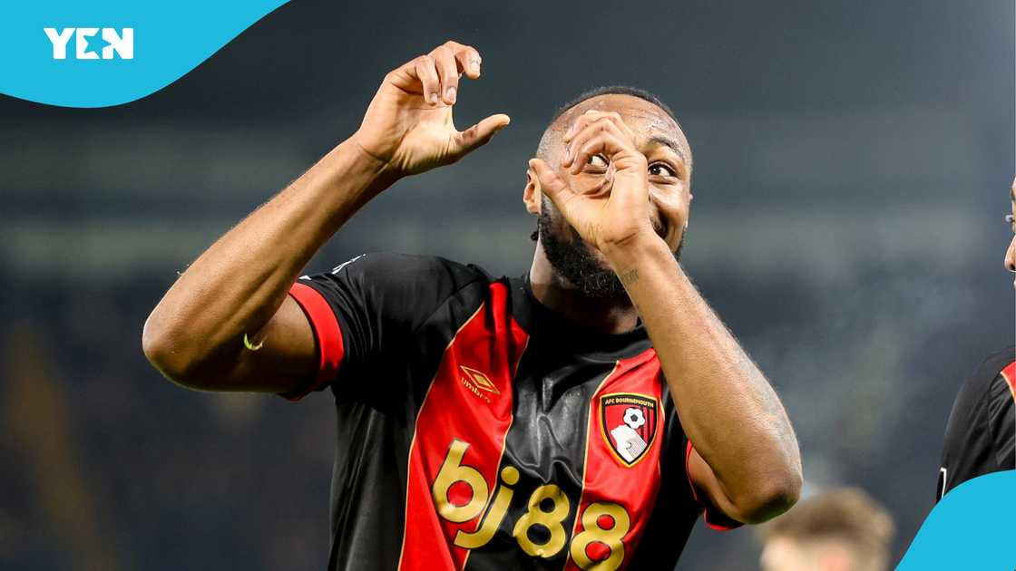 "Antoine Semenyo celebrating with a signature gesture during a Bournemouth match."