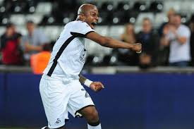 "Soccer player celebrating on the field."