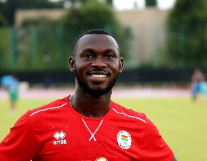 Benjamin Azamati, Ghanaian sprinter, smiling in a sports jersey.