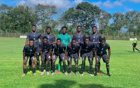 Karela United team posing for a group photo before a match.