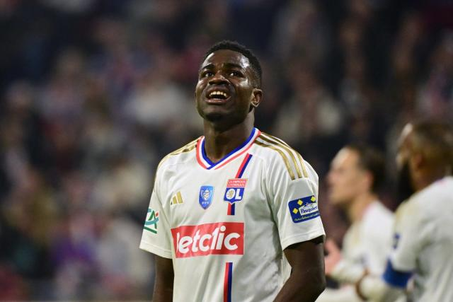 "Ernest Nuamah in action for Lyon during a match."