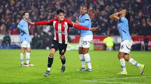 "Football player celebrating a goal during a match"