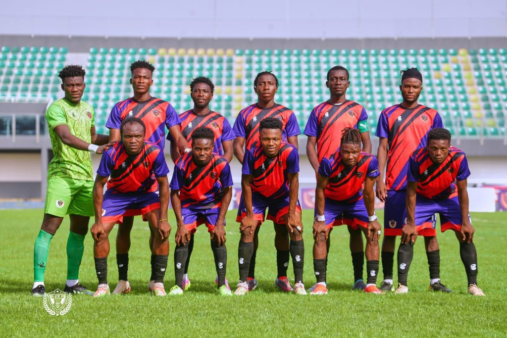 Nations FC team lined up for a pre-match photo.