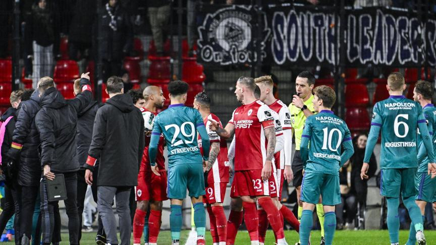 Players in a heated discussion after the match