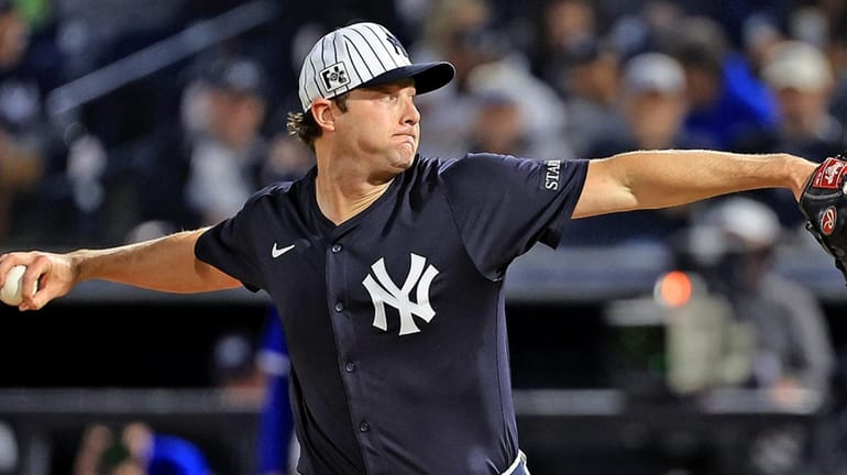 "New York Yankees pitcher in action during a game."