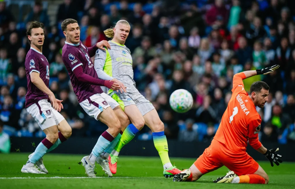 Manchester City Go Top as Burnley Relegated After Narrow 1-0 Win