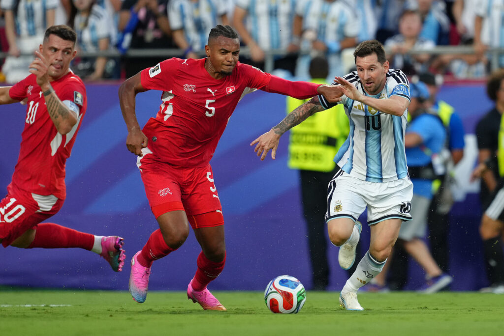 Argentina Survive Swiss Test to Keep World Cup Title Defense Alive