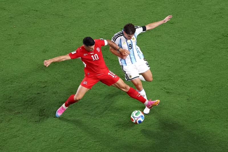 Argentina Survive Swiss Test to Keep World Cup Title Defense Alive