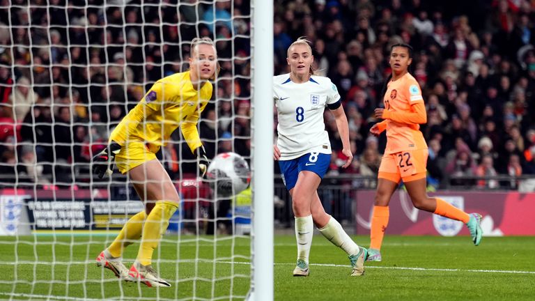 England vs Netherlands players on the go.