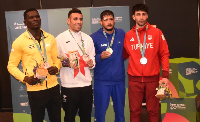 6th Islamic Solidarity Games: Uganda’s Boxer Ojok Smiles on the Podium with a Bronze Medal