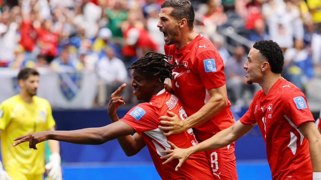 Switzerland attacker challenges Bosnia defender during World Cup 2026 match in Los Angeles.