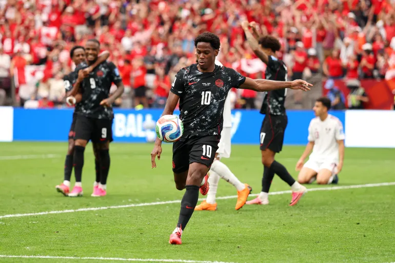 Canadian forward attacks Qatar's defense in FIFA World Cup 2026 Group B fixture