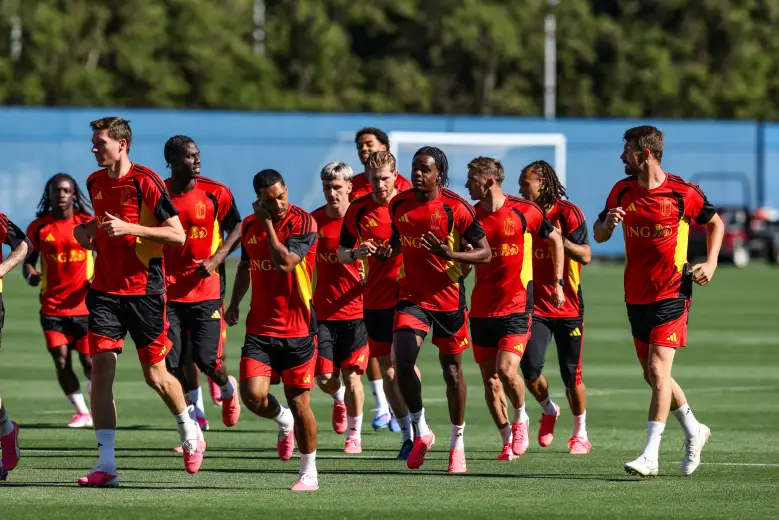 Football match players running on the ground