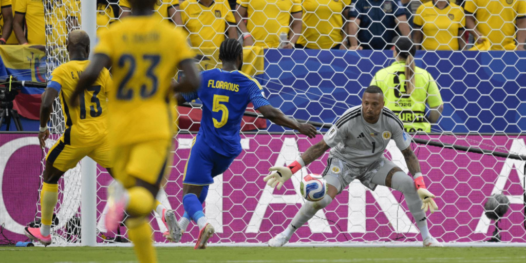 Ecuador and Curacao players battle for possession