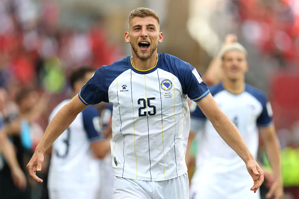 New Zealand footballer celebrating a goal