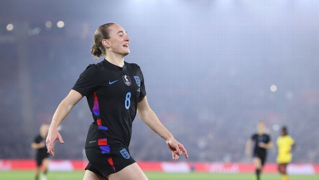 England women's player celebrates during a football match