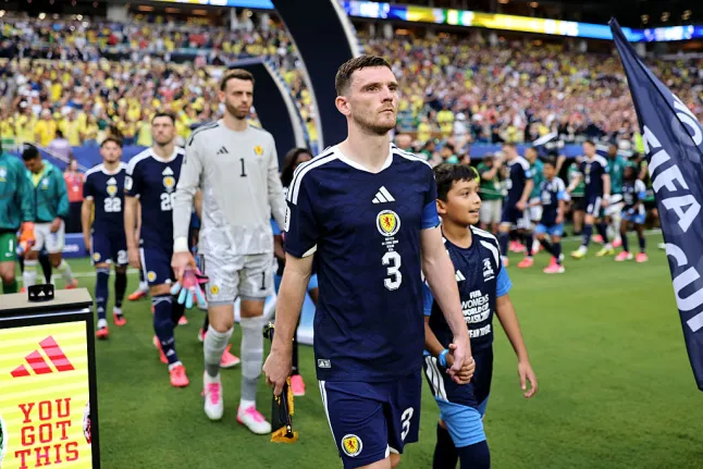 the player hold the hands of his child
