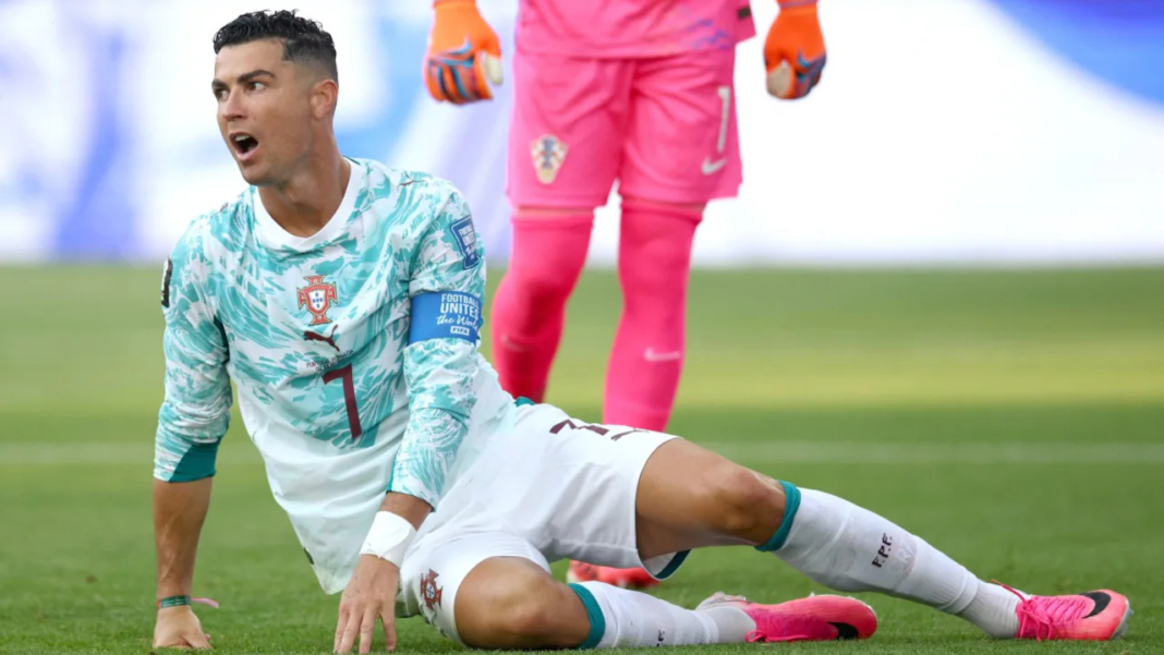 Cristiano Ronaldo falls down