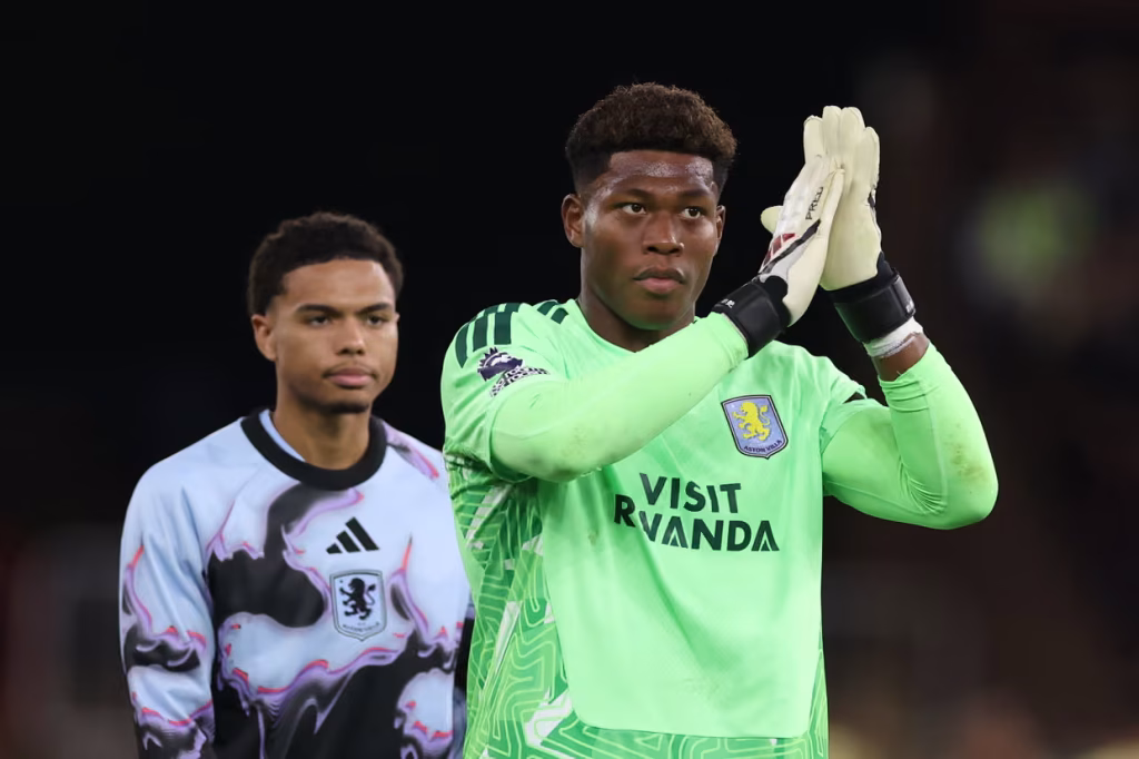 Zion Suzuki applauds Aston Villa supporters after the Premier League match against Arsenal.
