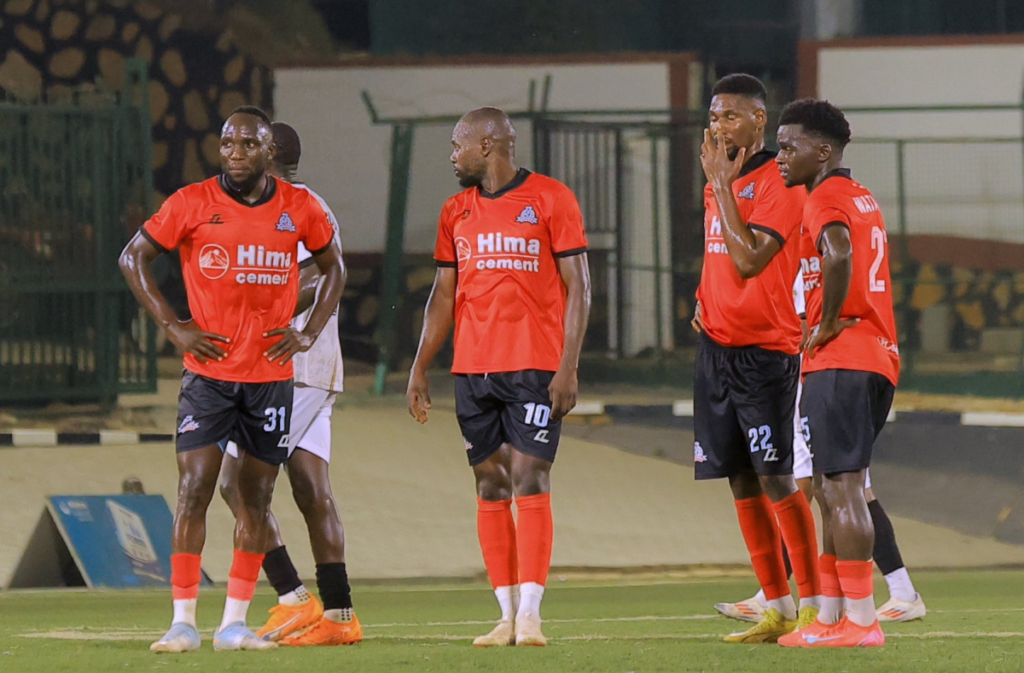 Farouk Miya, wearing Vipers’ number 10 shirt, stands with teammates following their Uganda Premier League loss to Entebbe UPPC