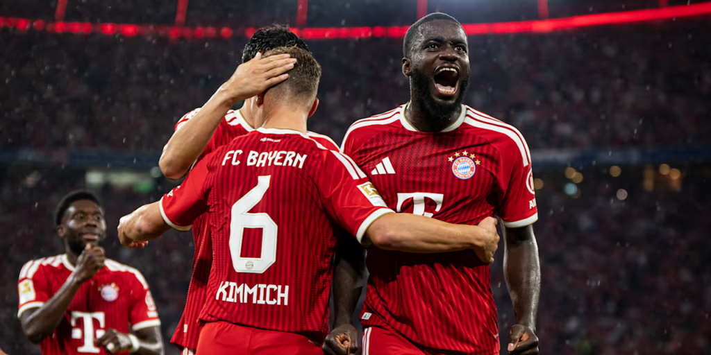Dayot Upamecano celebrates his goal with Joshua Kimmich during Bayern Munich’s win over Stuttgart.