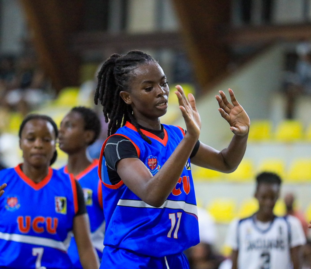 UCU Lady Canons basketball player wearing number 11 applauds during the women’s NBL Finals.