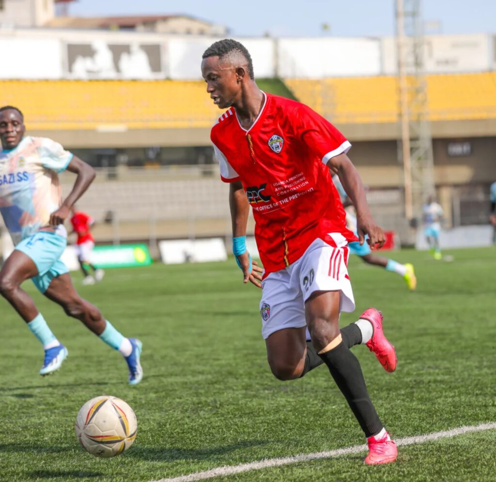 Entebbe UPPC midfielder Reich Triomphe Kokolo dribbles the ball forward during the UPL match against Lugazi FC.