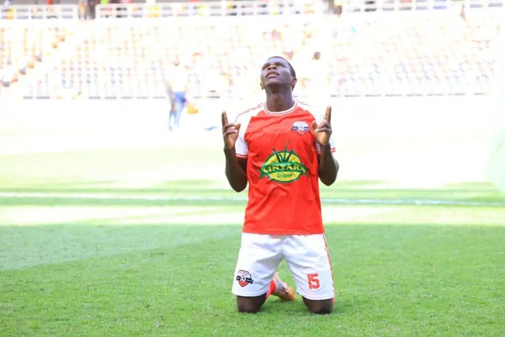 Jimmy Kalema of Kitara FC celebrating after scoring his team's opening goal.