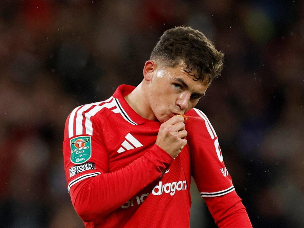 Manchester United's Shea Lacey celebrates scoring on his first start for the club, aged 19.