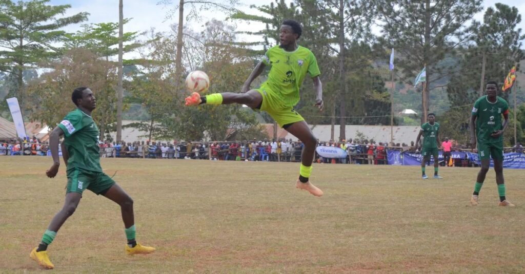 Players from Busujju and Butambala challenging for the ball during their match.