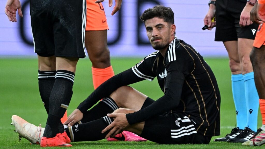 Arsenal player Kai Havertz reacting after picking up an injury during a match in Amsterdam.
