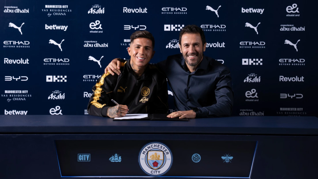 Enzo Fernández and Hugo Viana pose together at the Manchester City contract signing.