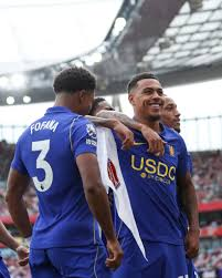 Morgan Rogers celebrating his goal for Chelsea against Arsenal, Premier League 2026/27.