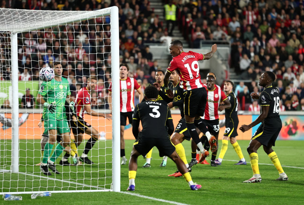 Brentford player Jaidon Anthony rising to head the ball, putting his side in front.