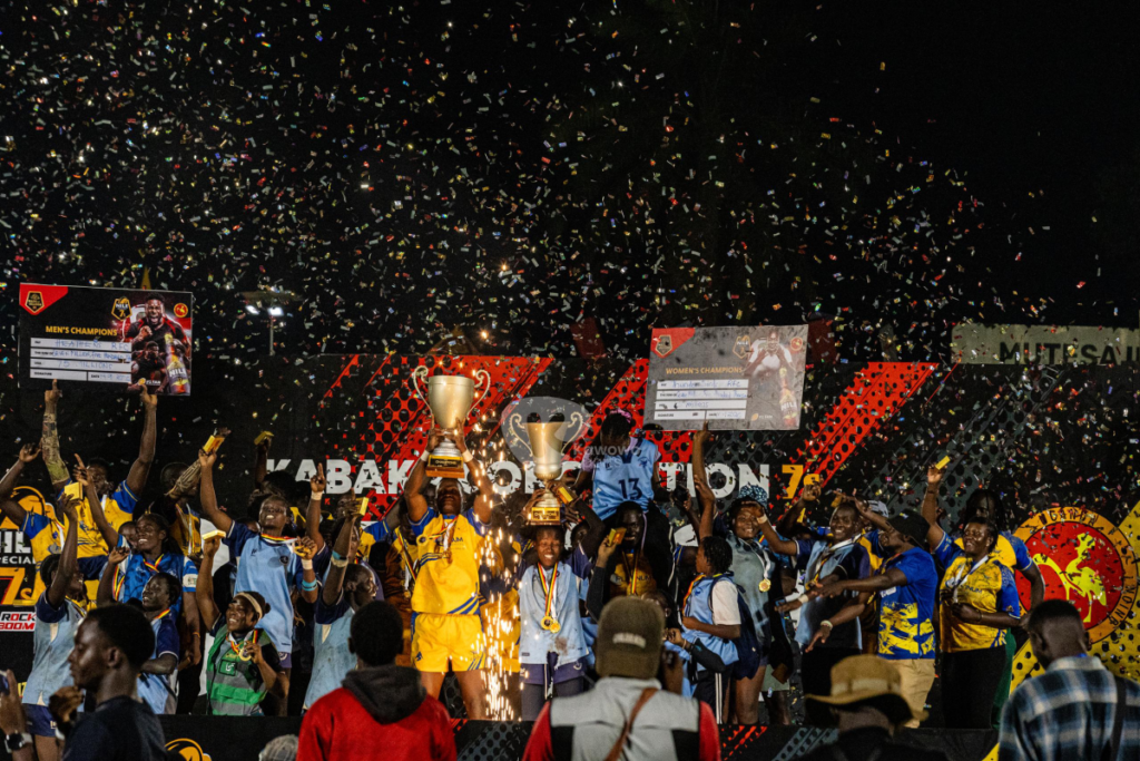 Heathens and Thunderbirds rugby players celebrating together, each holding up their National 7s trophies.