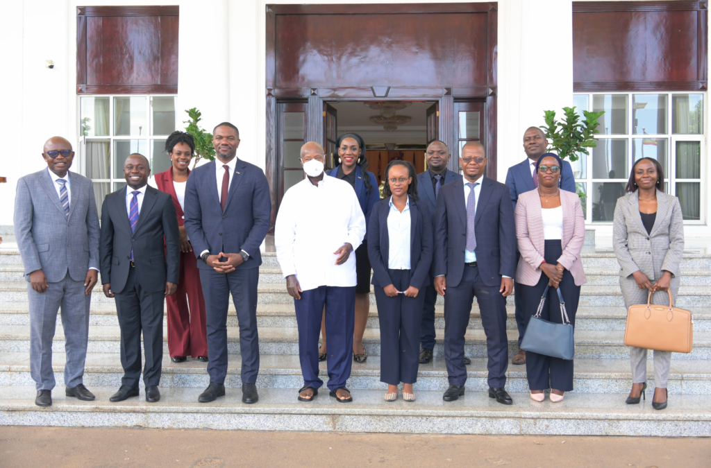 Uganda's President with CAF Secretary General Samson Adamu and the National AFCON Task Force at State House Entebbe.
