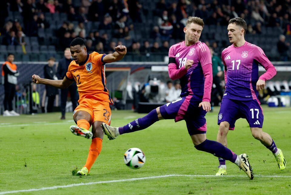 Archive photo from March 2024: Germany players Maximilian Mittelstädt and Florian Wirtz challenging Netherlands' Denzel Dumfries at Deutsche Bank Park, Frankfurt.