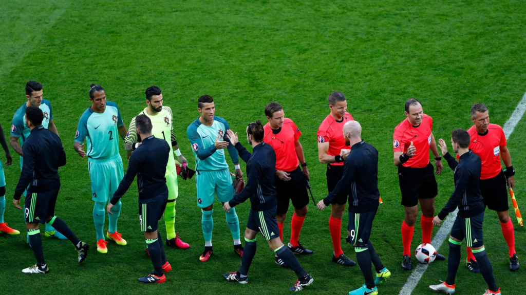 Archive photo from 6 July 2016: Portugal's Cristiano Ronaldo and Wales' Gareth Bale shaking hands before their Euro 2016 semi-final in Lyon.