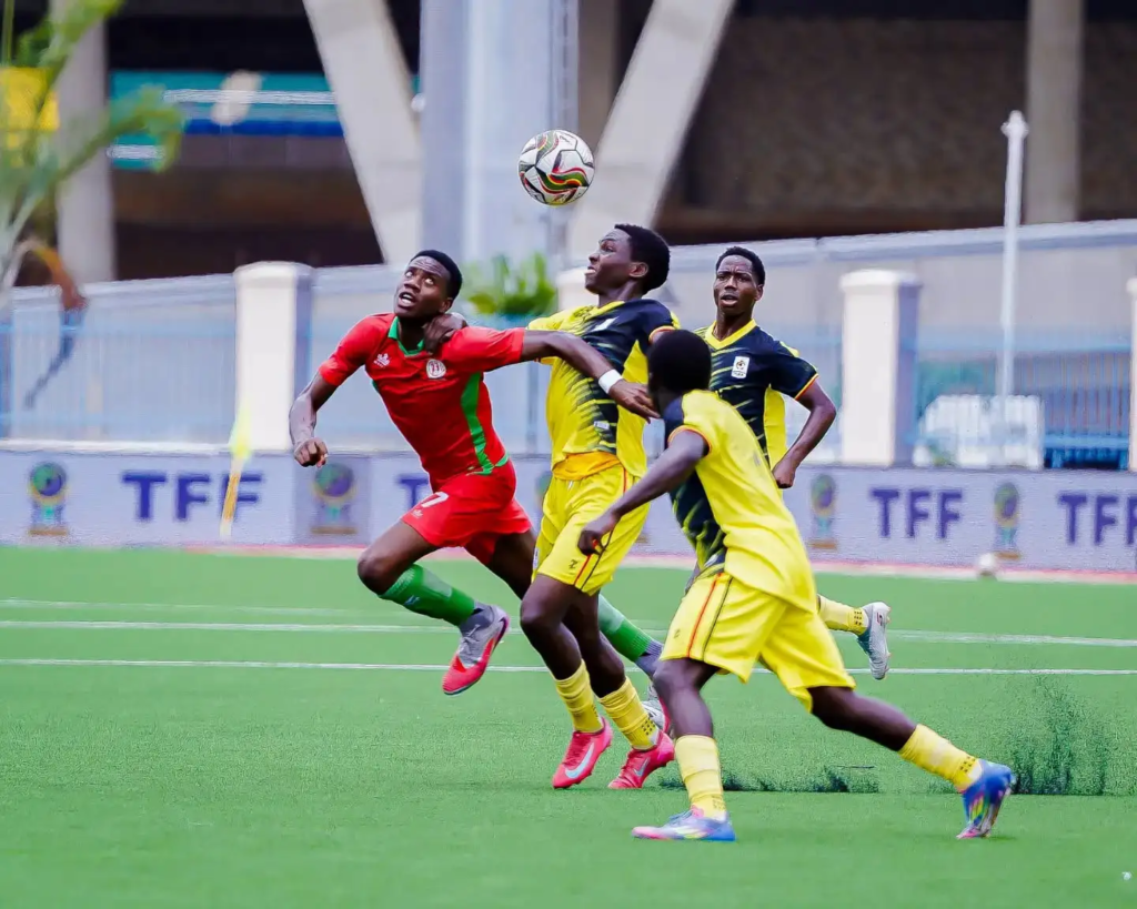 Players from Uganda U-20 and Burundi U-20 in action during their match.