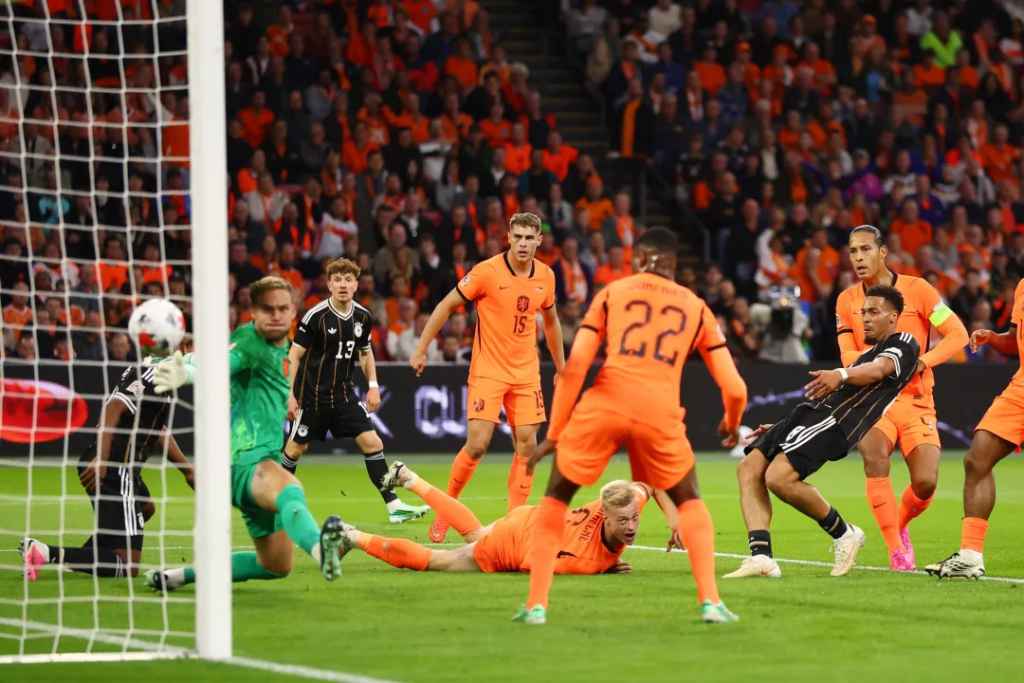 Felix Nmecha of Germany celebrating after scoring his team's first goal against the Netherlands at Johan Cruijff Arena, Amsterdam, in the UEFA Nations League.