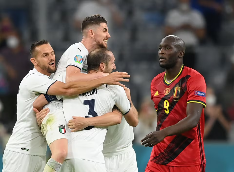 Archive photo from 2 July 2021: Italy players celebrating their Euro 2020 quarter-final victory as Belgium's Romelu Lukaku stands dejected, at Football Arena Munich.