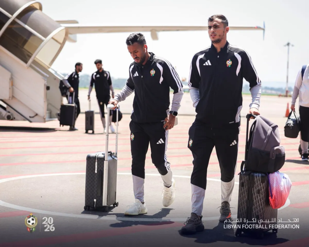 Members of the Libya national football team arriving at Kabalega International Airport.