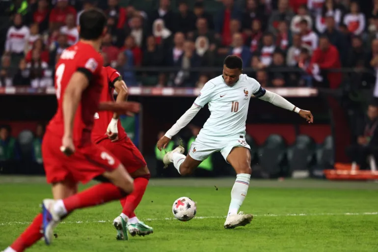 France forward Kylian Mbappé scoring his team's first goal.