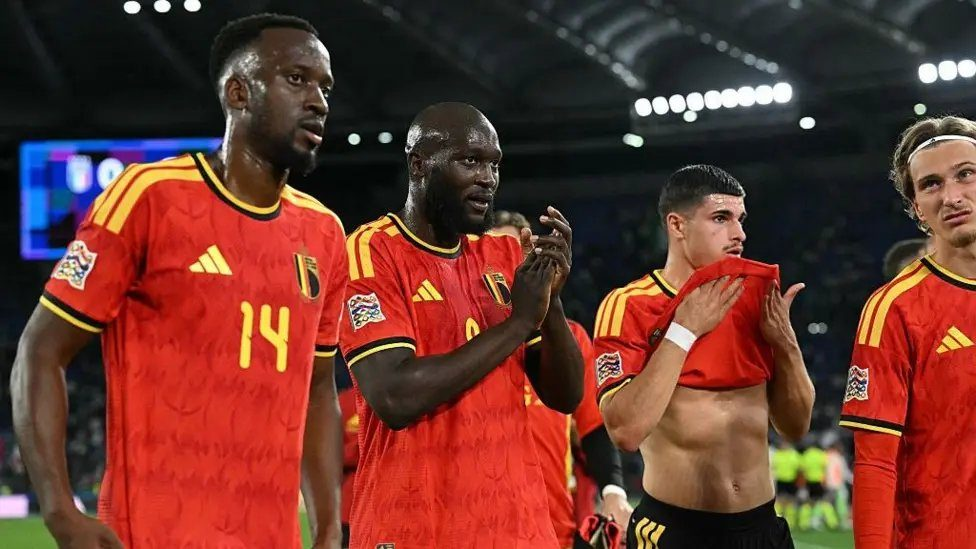 Belgium's Dodi Lukebakio, on the left, celebrating after scoring his side's second goal.