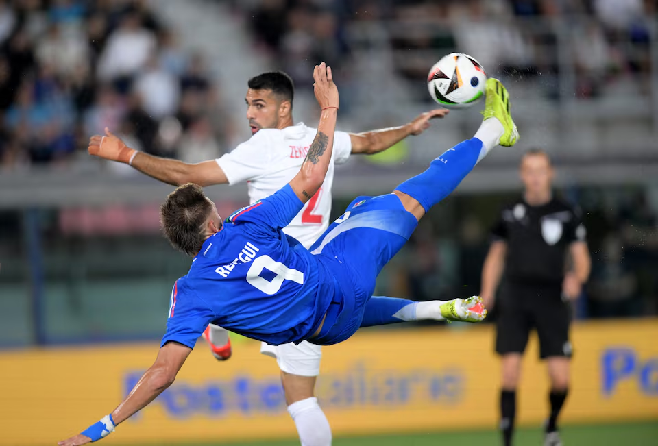 Archive photo from June 2024: Italy's Mateo Retegui in action with Turkey's Zeki Çelik during their international friendly at Stadio Renato Dall'Ara, Bologna.