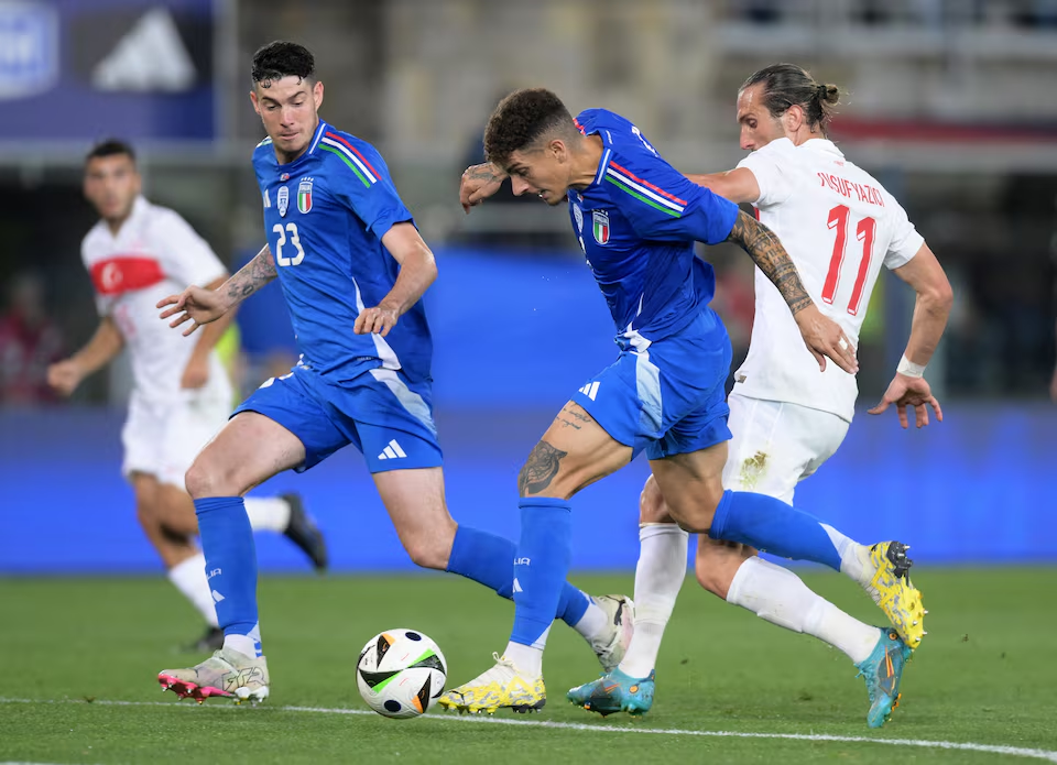 Archive photo from June 2024: Italy's Giovanni Di Lorenzo and Alessandro Bastoni challenging Turkey's Yusuf Yazıcı during their international friendly at Stadio Renato Dall'Ara, Bologna.