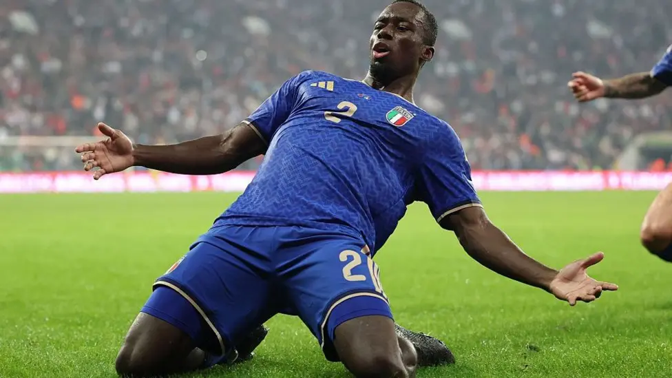 Brentford defender Michael Kayode celebrating after scoring on his international debut for Italy.