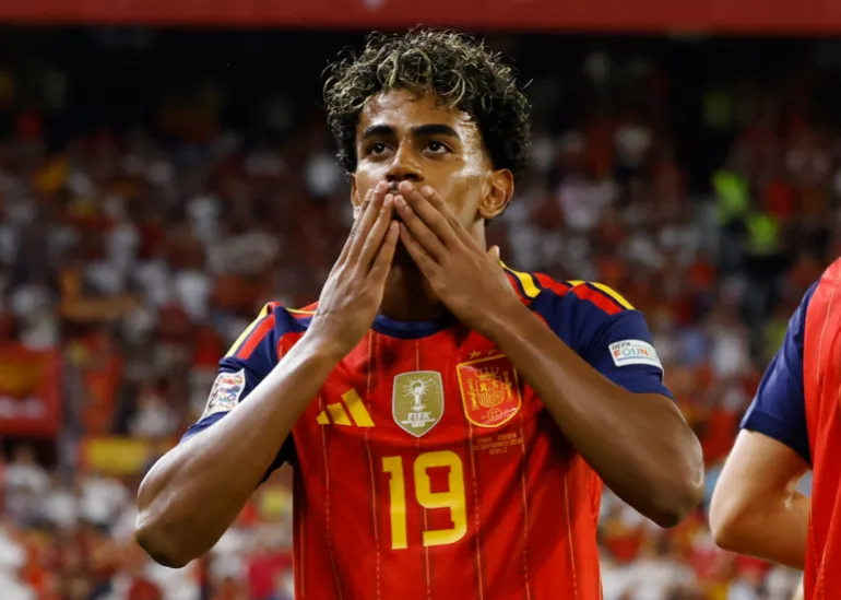 Lamine Yamal celebrates after scoring Spain’s third goal.