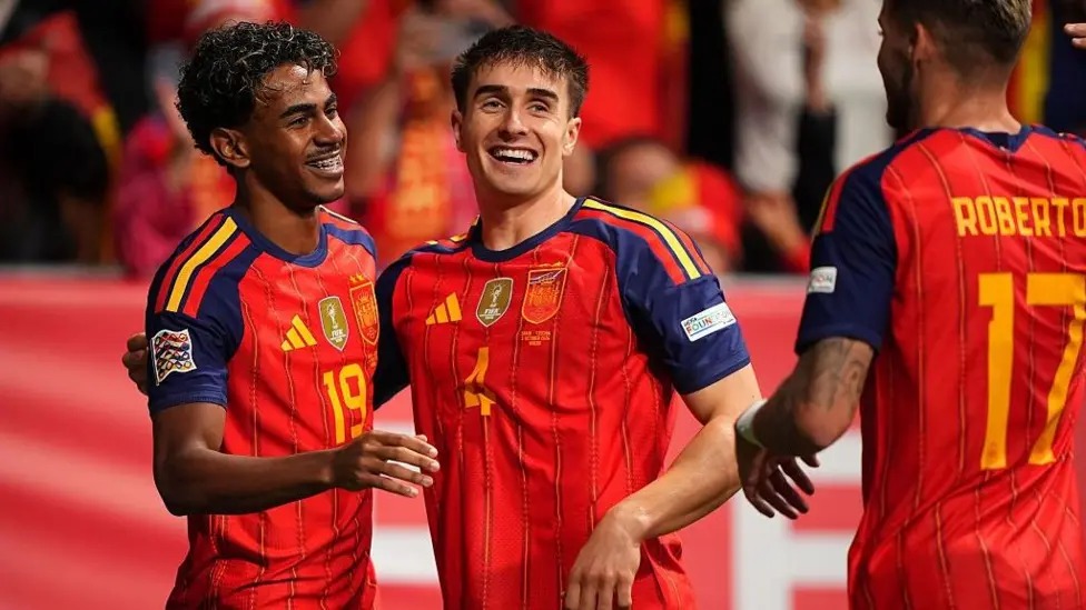 Spain forward Lamine Yamal, on the left, pictured during a Nations League match.